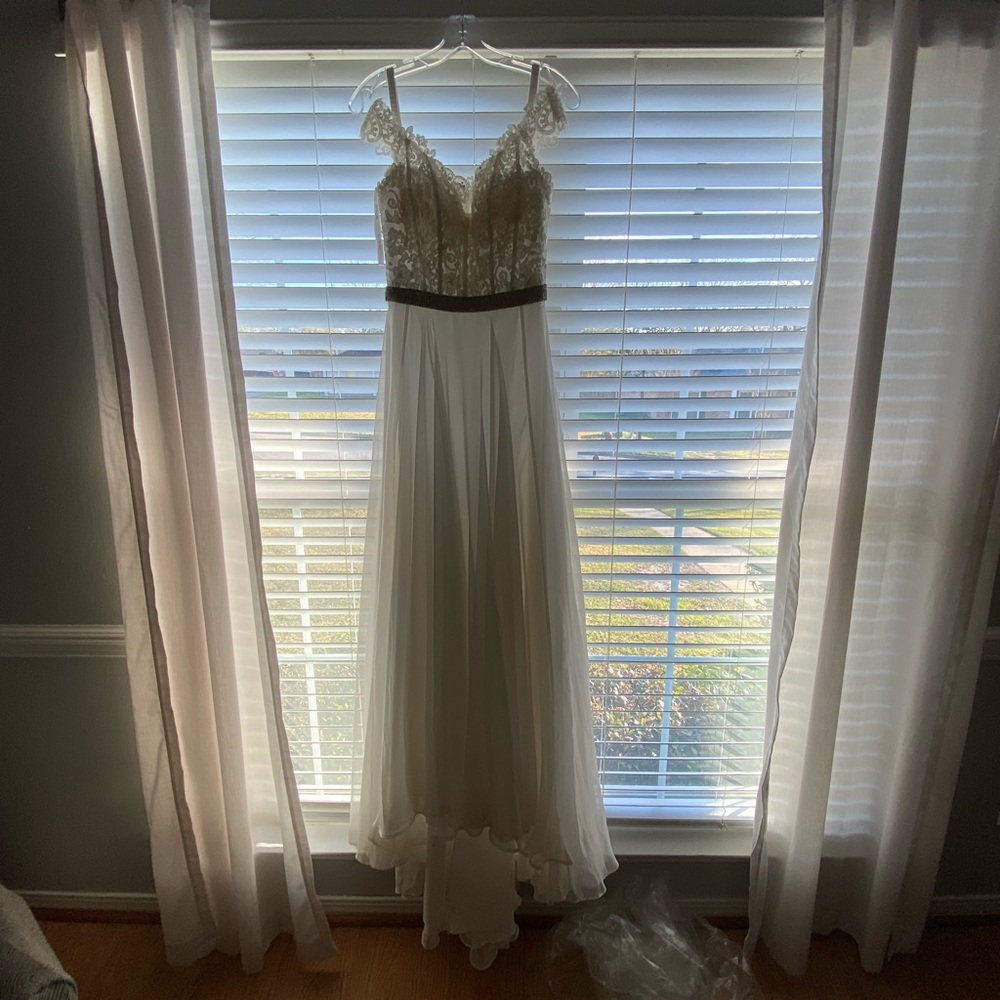 Sherri Hill dress…. Beautiful dress, white with lace, off the shoulder.
